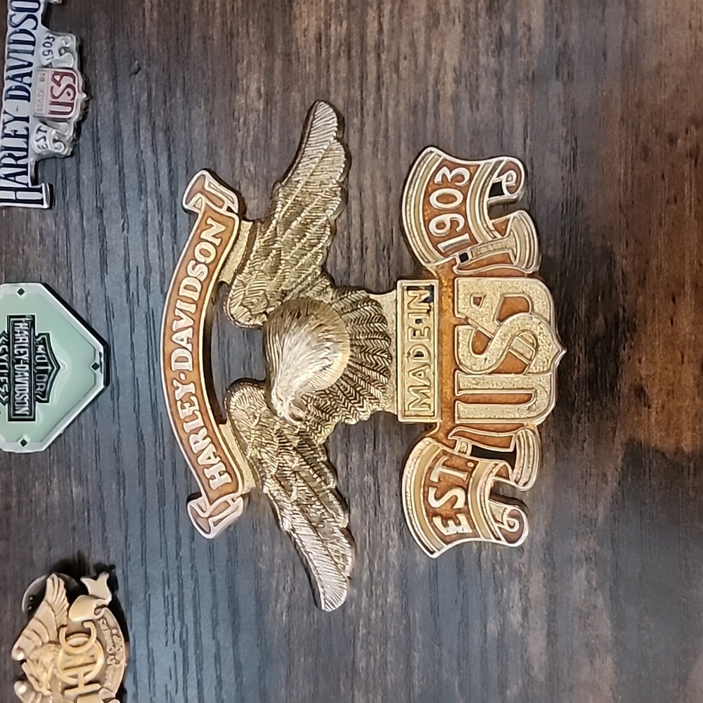 Lot of Harley Davidson vintage decals and Concho with leather  ties.